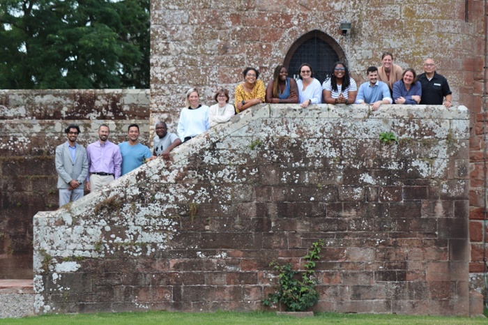 Rose Castle Foundation Odyssey Fellows on Strickland Tower steps Rose Castle